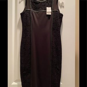 Calvin Kline Black dress with lace and leather accent.